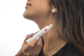 Sultry Rollerball Perfume Being Applied to Neck