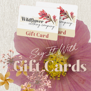 Wildflower Clothing Company gift cards with floral design on a textured background