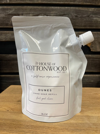 House of Cottonwood Dunes hand soap refill on a wooden surface