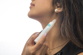 Tender Rollerball Perfume Being Applied to Neck